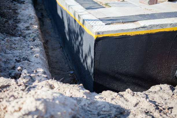 Professional Waterproofing technician working in Midland, NC